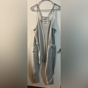 Free people movement gray hot shot onesie. SMALL